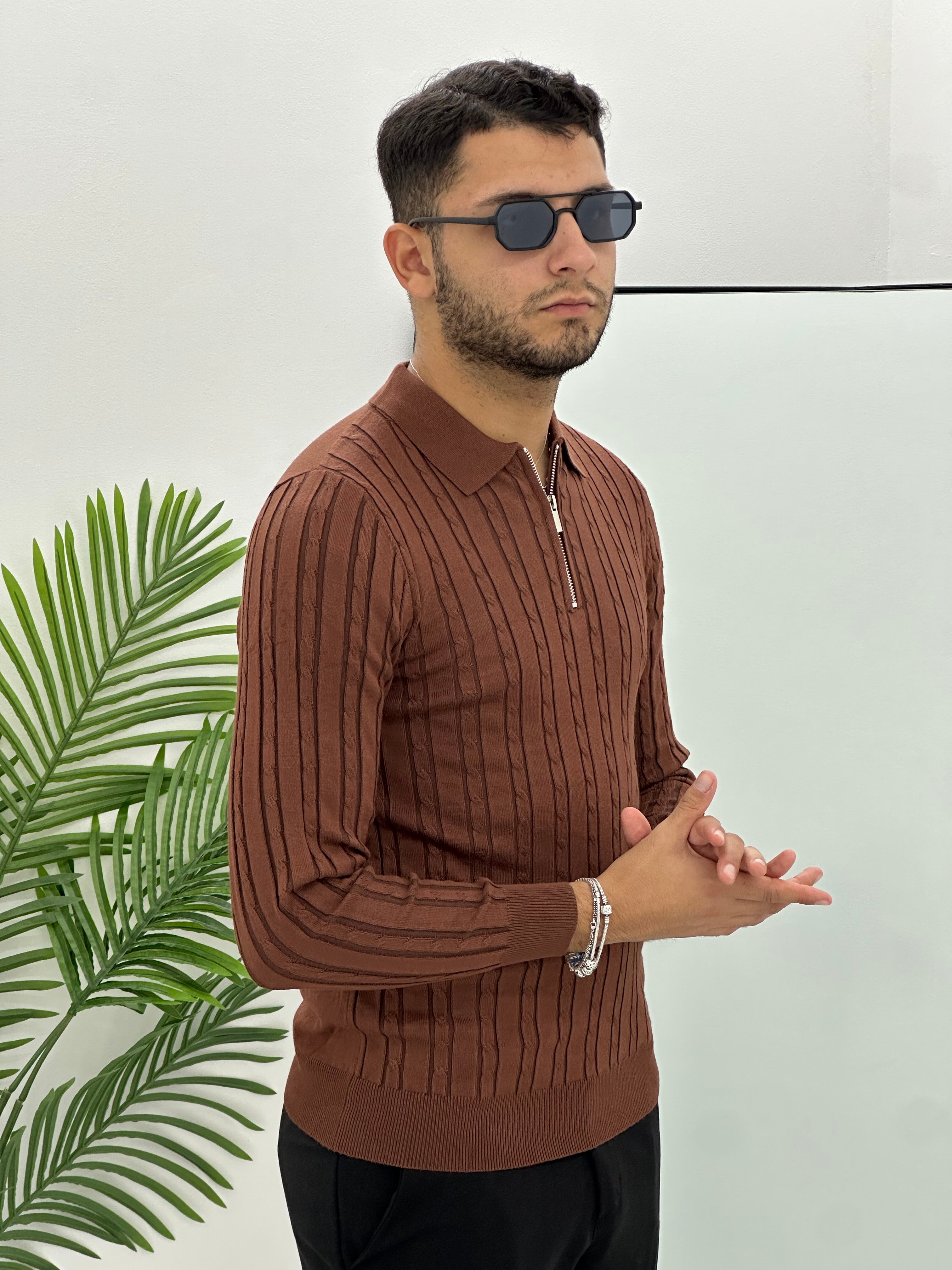 POLO CON ZIP INTRECCIATO