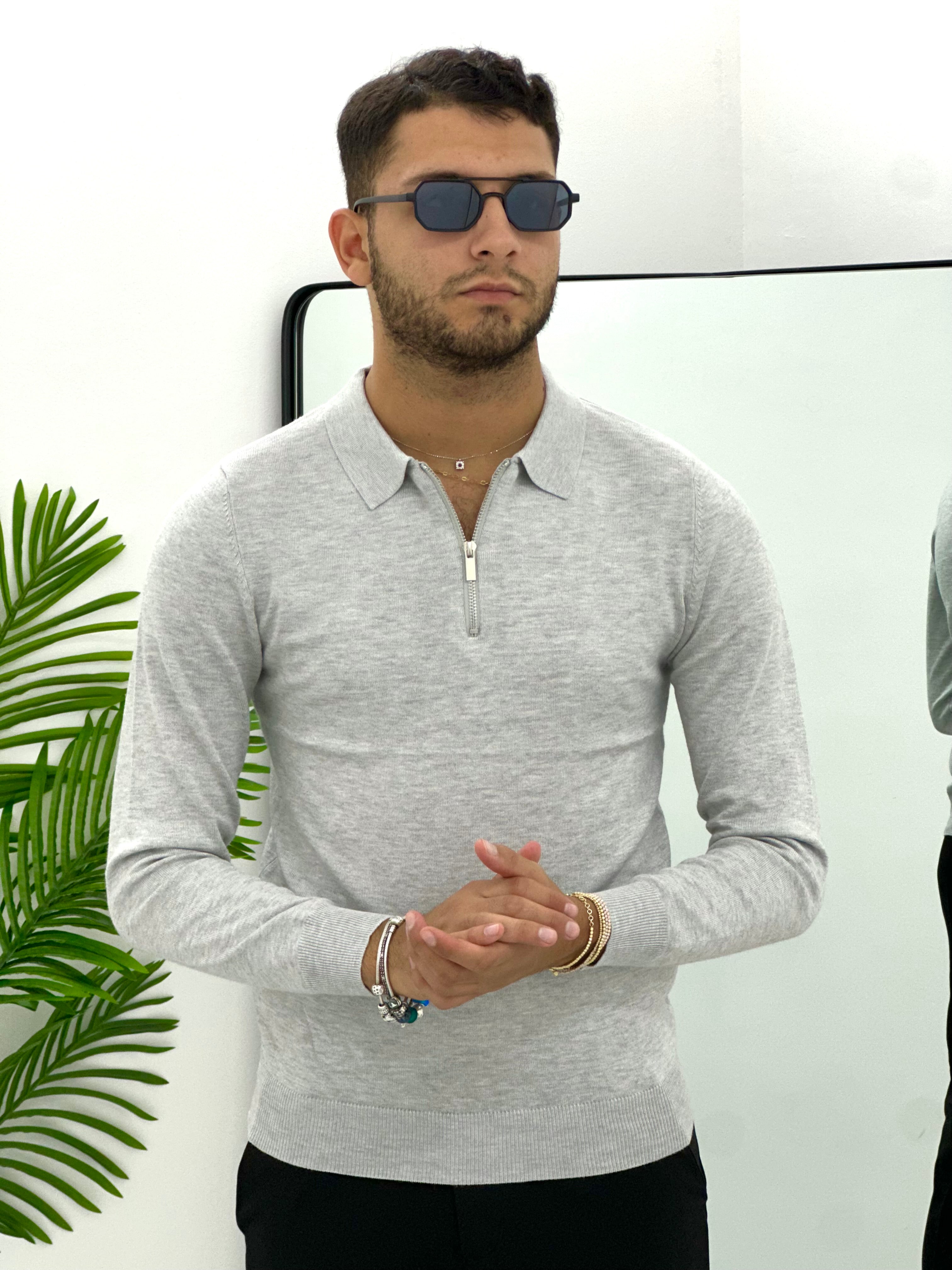 POLO CON ZIP IN FILO