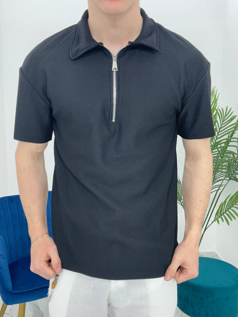 POLO CON ZIP A COSTINE TAGLIO VIVO