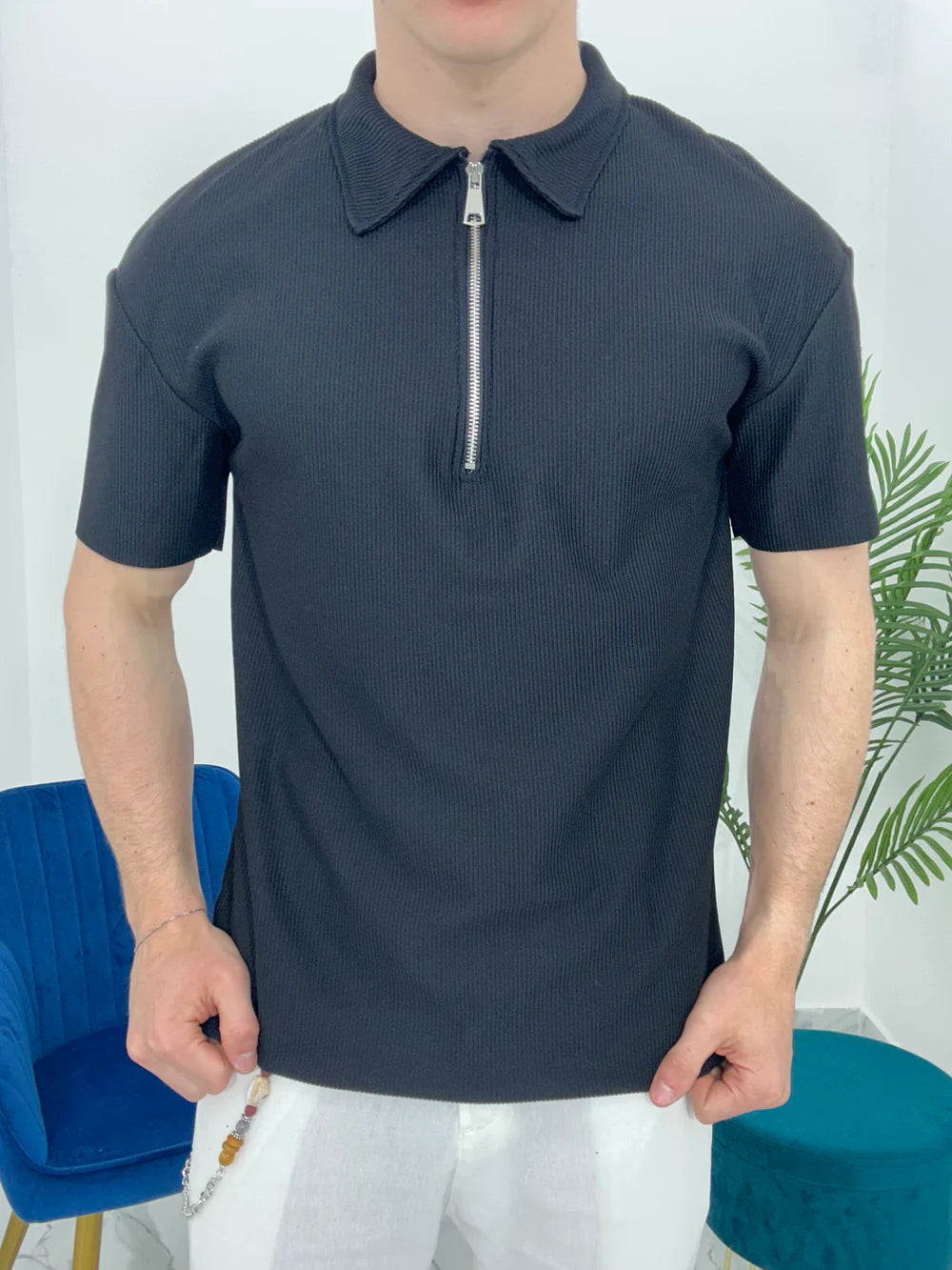 POLO CON ZIP A COSTINE TAGLIO VIVO