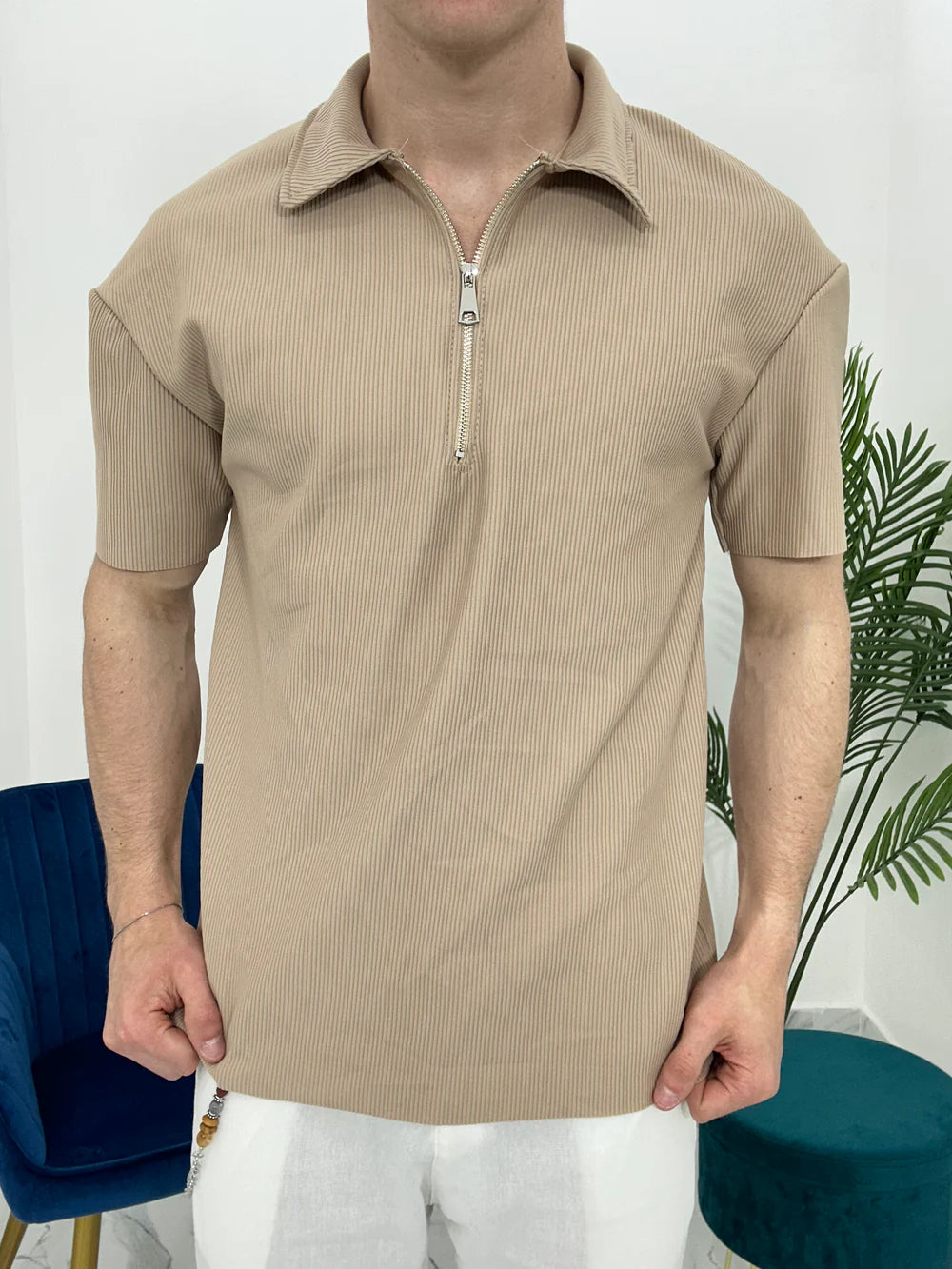 POLO CON ZIP A COSTINE TAGLIO VIVO