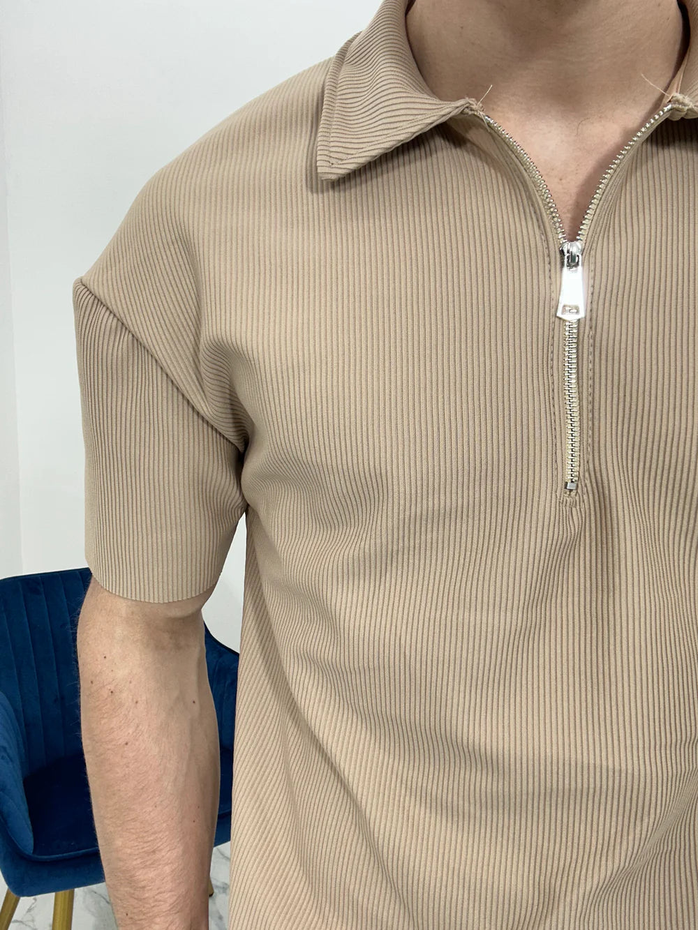 POLO CON ZIP A COSTINE TAGLIO VIVO