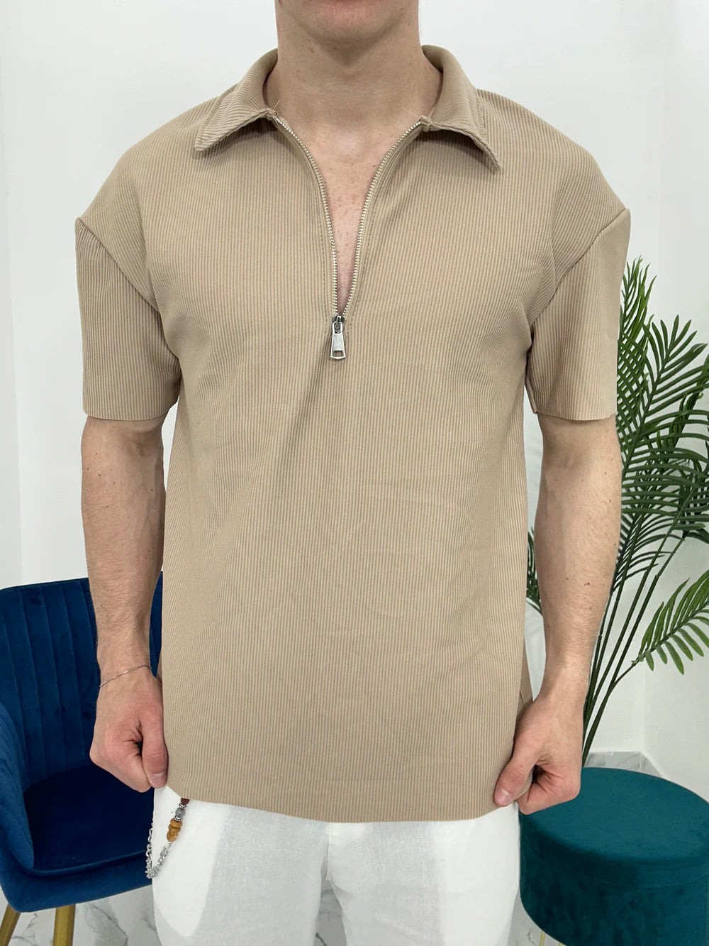 POLO CON ZIP A COSTINE TAGLIO VIVO