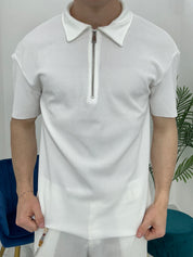 POLO CON ZIP A COSTINE TAGLIO VIVO