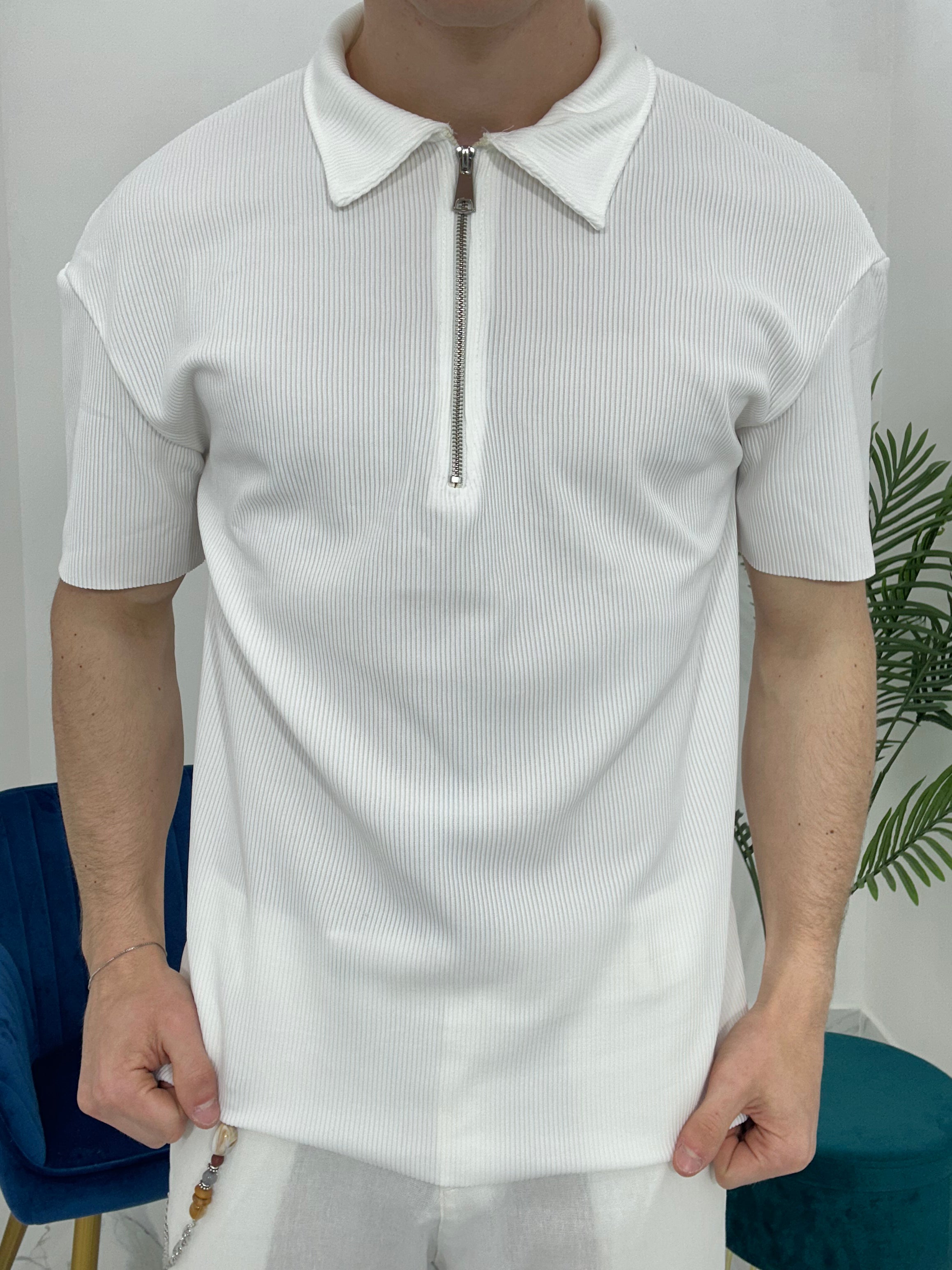 POLO CON ZIP A COSTINE TAGLIO VIVO