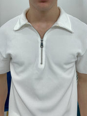 POLO CON ZIP A COSTINE TAGLIO VIVO