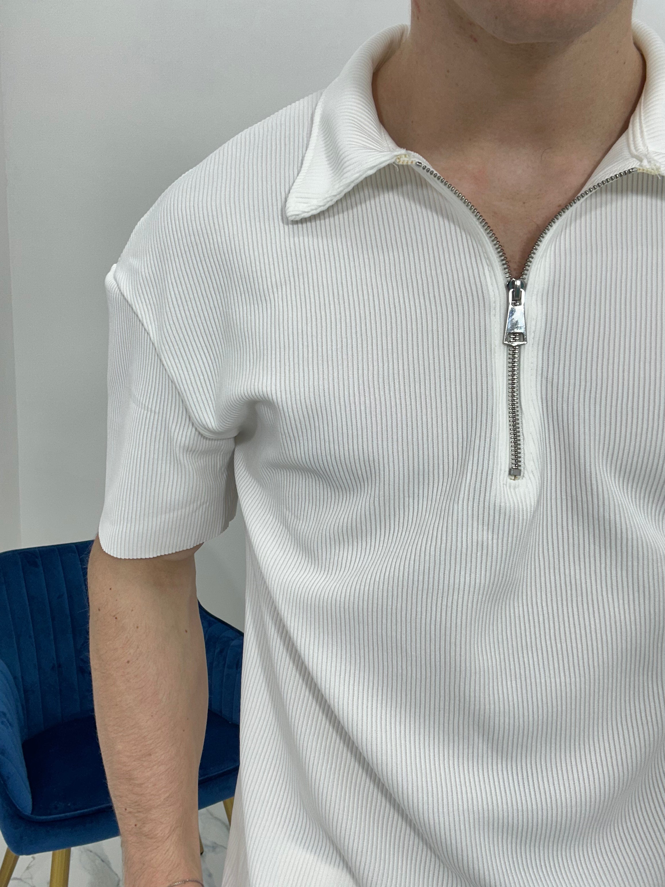 POLO CON ZIP A COSTINE TAGLIO VIVO