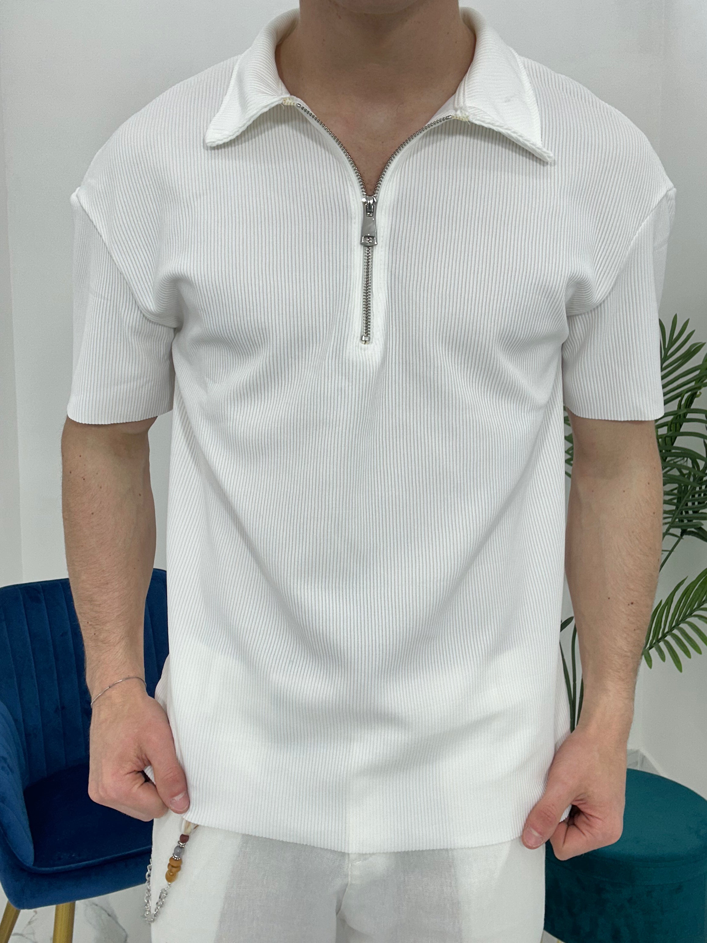 POLO CON ZIP A COSTINE TAGLIO VIVO