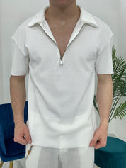 POLO CON ZIP A COSTINE TAGLIO VIVO