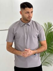 POLO CON ZIP A COSTINE TAGLIO VIVO