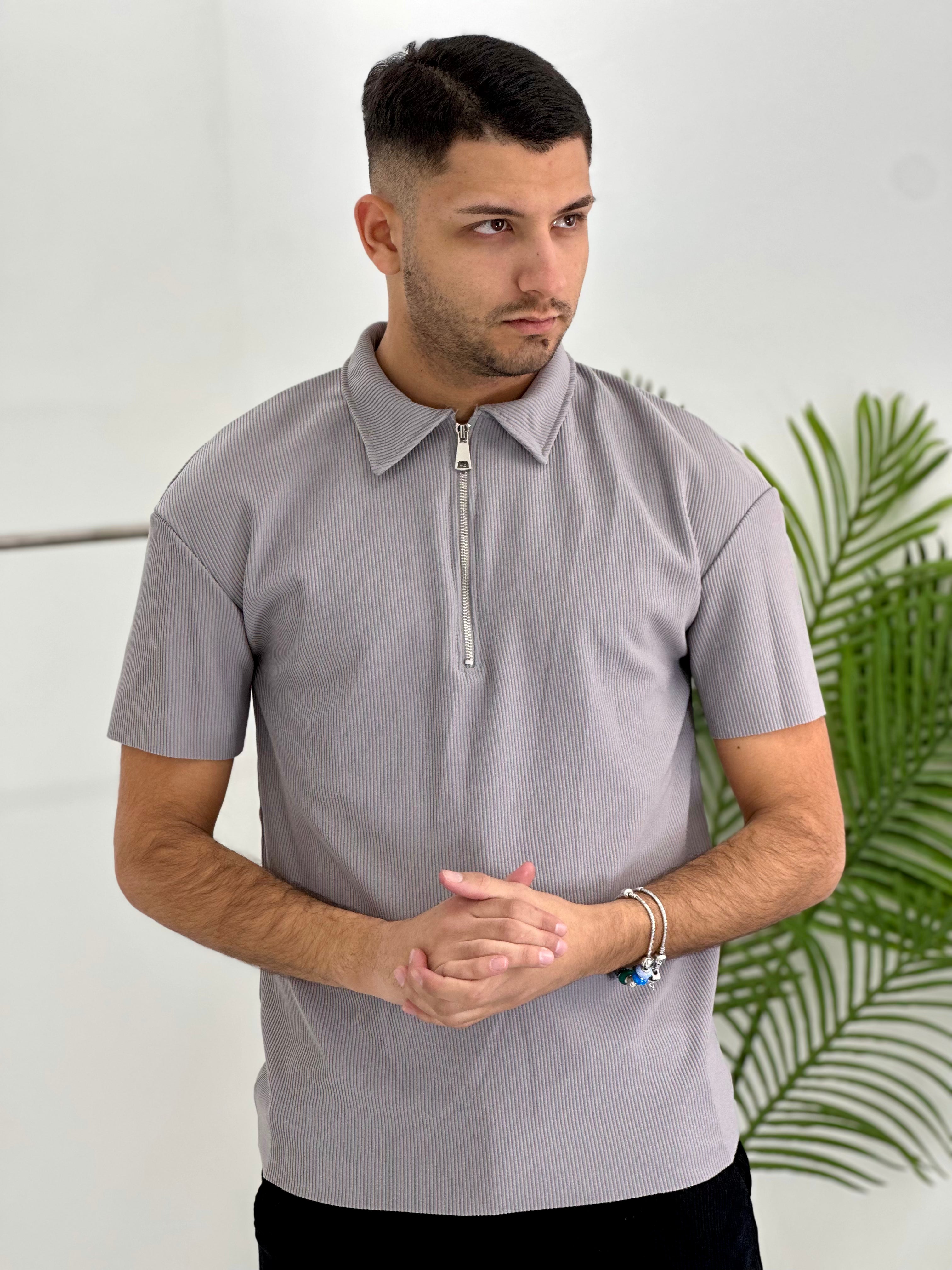 POLO CON ZIP A COSTINE TAGLIO VIVO