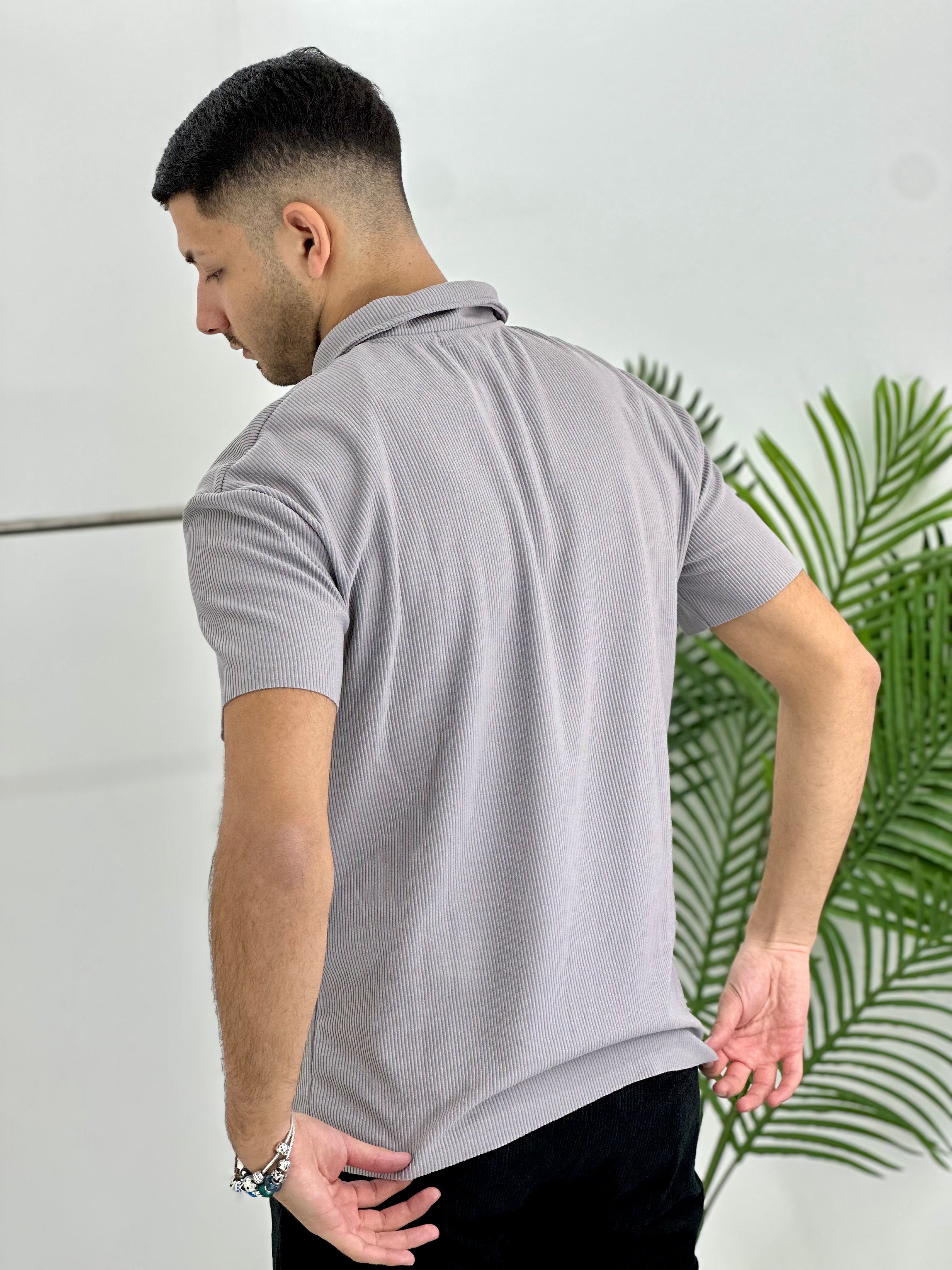 POLO CON ZIP A COSTINE TAGLIO VIVO