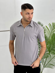 POLO CON ZIP A COSTINE TAGLIO VIVO