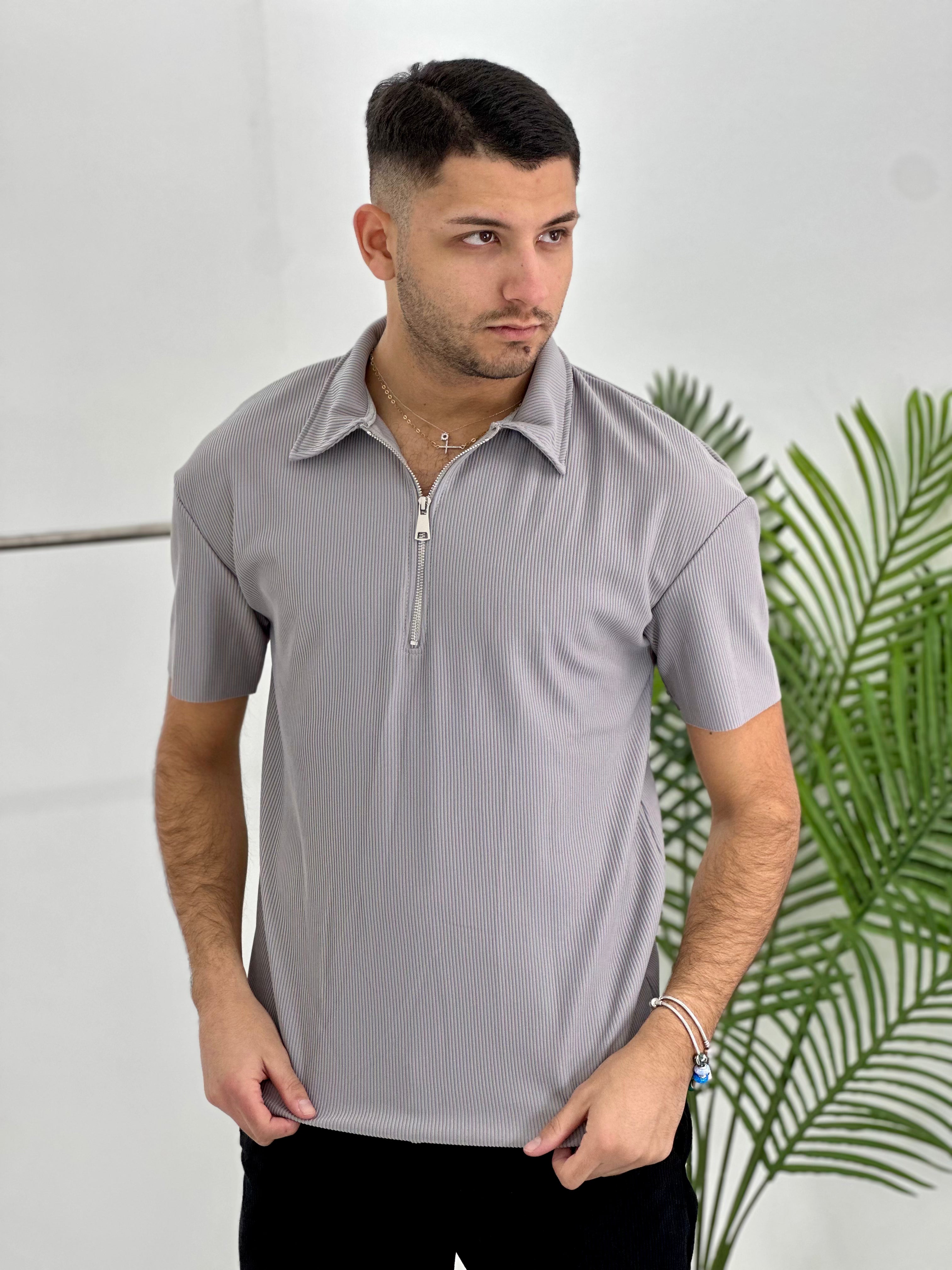 POLO CON ZIP A COSTINE TAGLIO VIVO