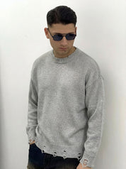 MAGLIONE CON ROTTURE