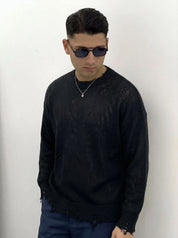 MAGLIONE CON ROTTURE