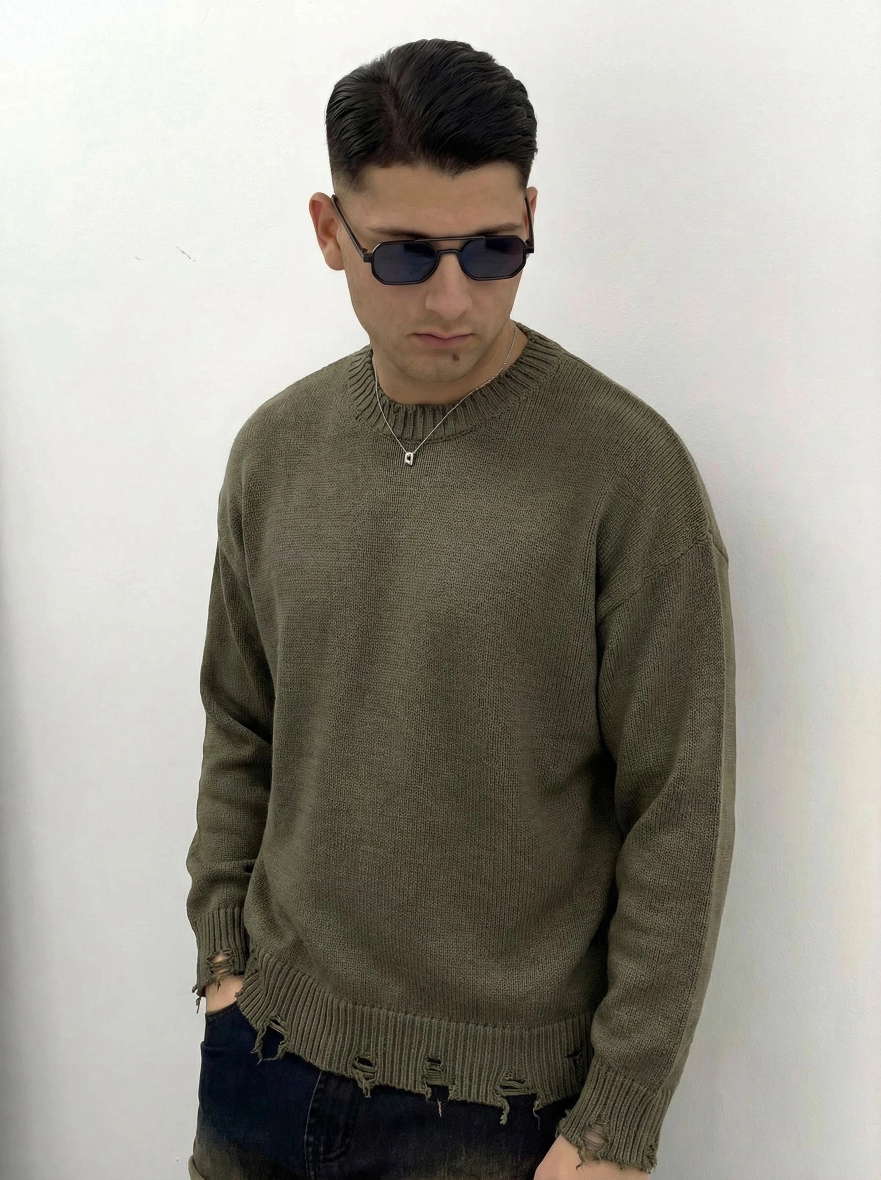 MAGLIONE CON ROTTURE