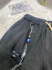 PANTALONCINI CON STRAPPI - col.NERO